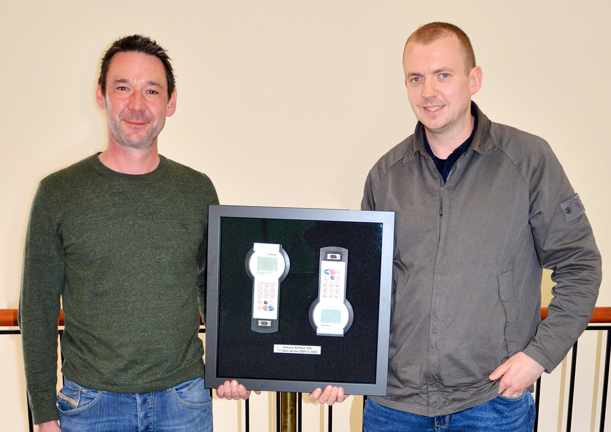James Griffin of Katronic Technologies Ltd. hands over the display case containing two hand-held flow measuring devices KATflow 200 to Flowhire Director Matt Bancroft